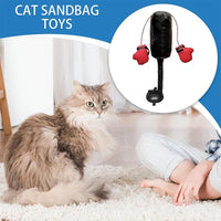 Gatos curiosos con el saco de boxeo GetZenko